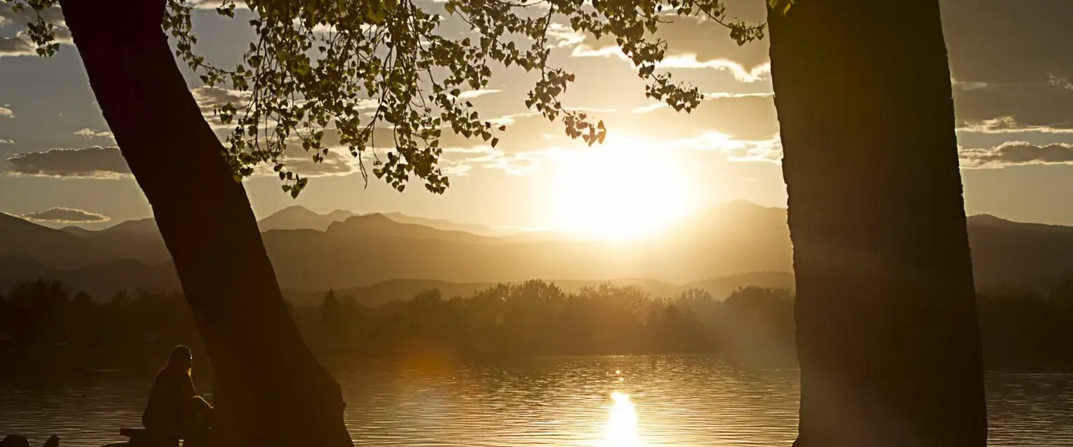 Photo: sunset over Lake Loveland with the foothills in silhouette